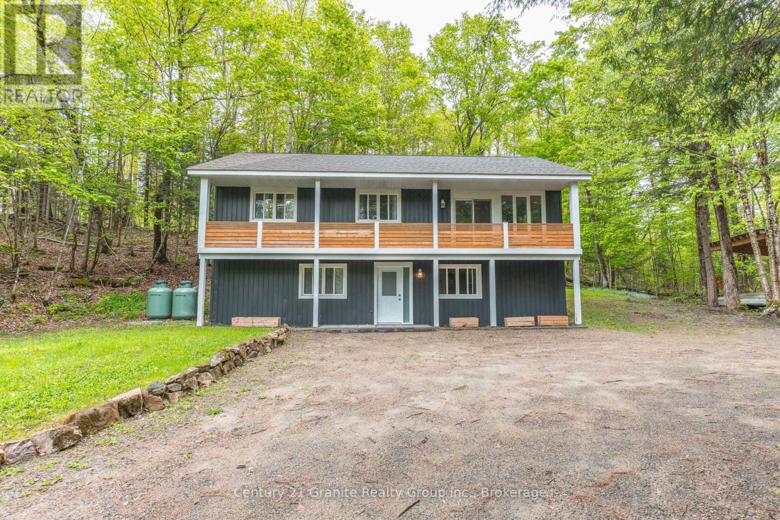 7032 County Road 121, Minden Hills, Ontario K0M 2K0 - Photo 1 - X12302603