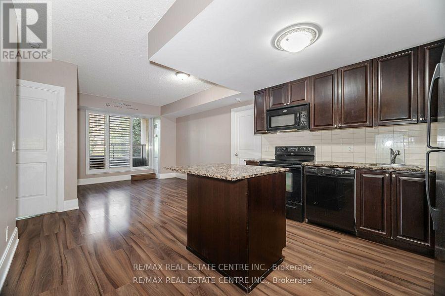 204 - 330 Burnhamthorpe Road, Mississauga, Ontario  L5B 0E1 - Photo 11 - W12302472