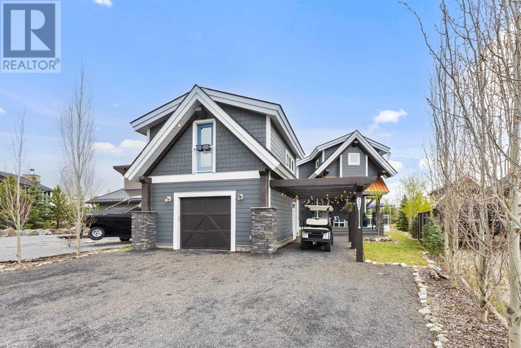332 Cottageclub Way, Rural Rocky View County, Alberta  T4C 1C3 - Photo 2 - A2225129