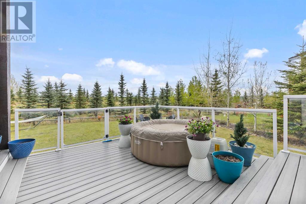 332 Cottageclub Way, Rural Rocky View County, Alberta  T4C 1C3 - Photo 25 - A2225129