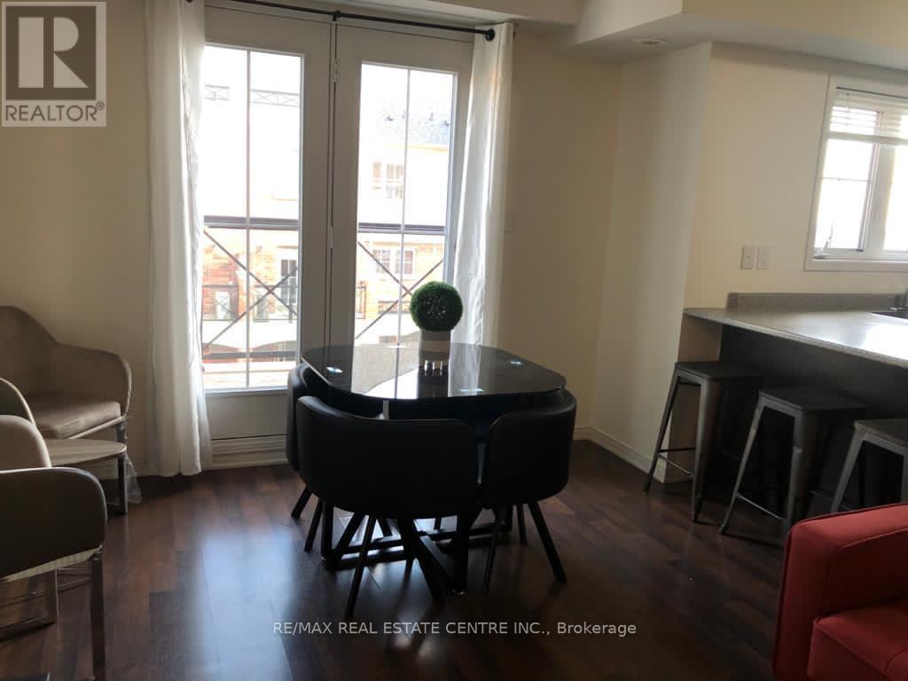 9 - 47 Hays Boulevard, Oakville, Ontario  L6H 0J1 - Photo 2 - W12303761