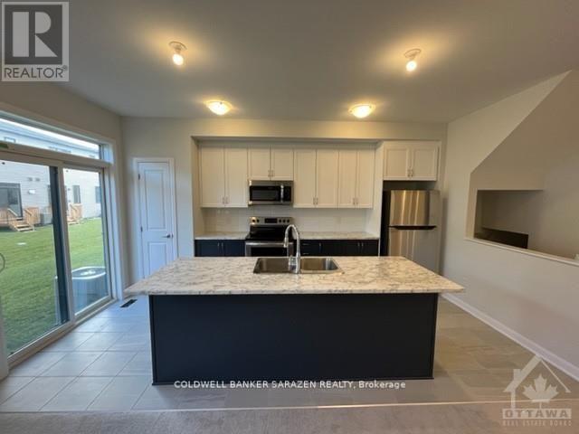 561 Aglish Mews, Ottawa, Ontario  K2J 6Y2 - Photo 5 - X12303929