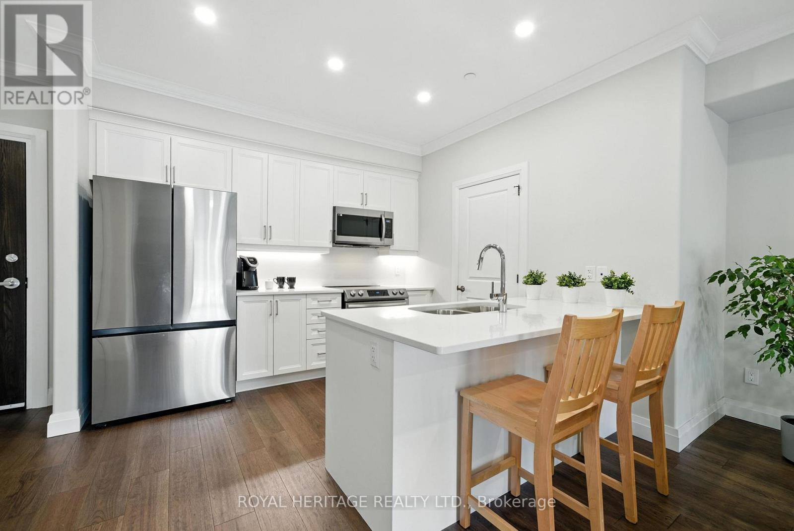 103 - 19 Hampton Lane, Selwyn, Ontario K0L 2H0 - Photo 2 - X12303953