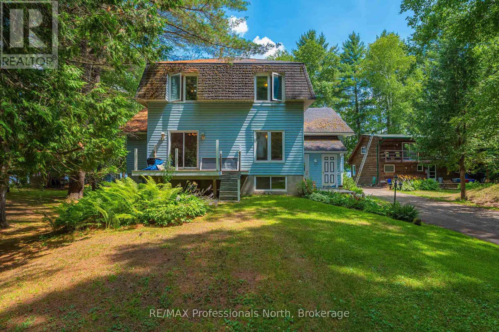 1015 Blackberry Lane, Minden Hills, Ontario  K0M 2K0 - Photo 2 - X12213252