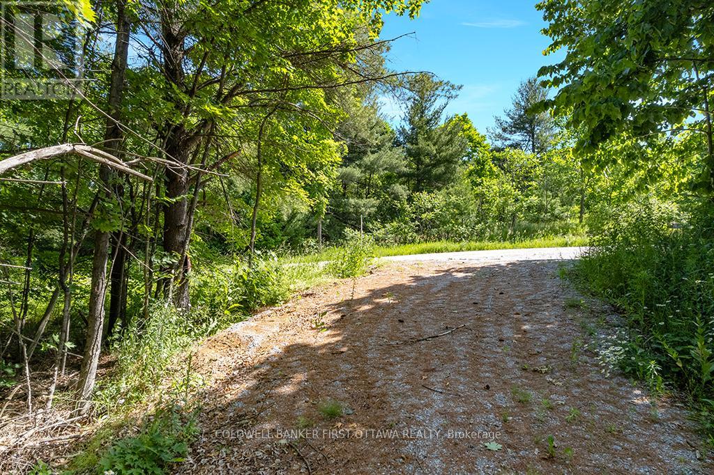 115 Doran Road, Tay Valley, Ontario  K7H 3C7 - Photo 12 - X12304850