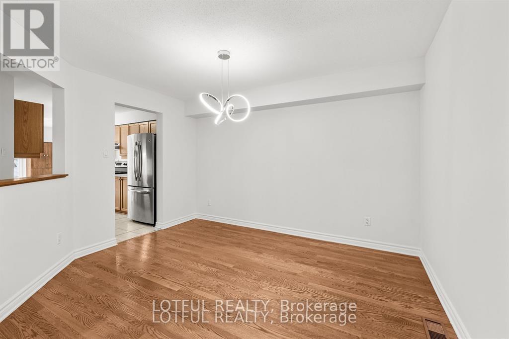 212 Meadowlilly Road, Ottawa, Ontario  K1T 4H1 - Photo 5 - X12301388