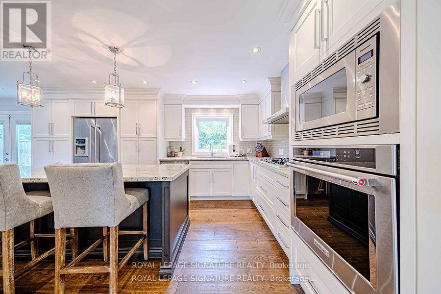 41 Mayo Drive, Toronto, Ontario  M6L 2X4 - Photo 3 - W12306348