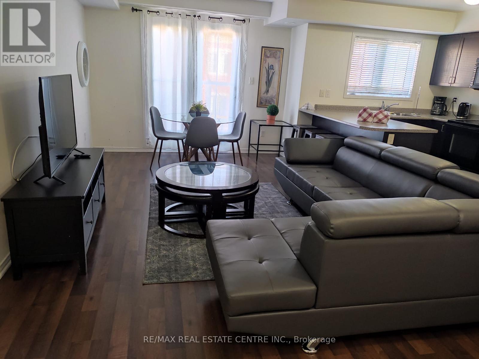 9 - 47 Hays Boulevard, Oakville, Ontario  L6H 0J1 - Photo 1 - W12303761