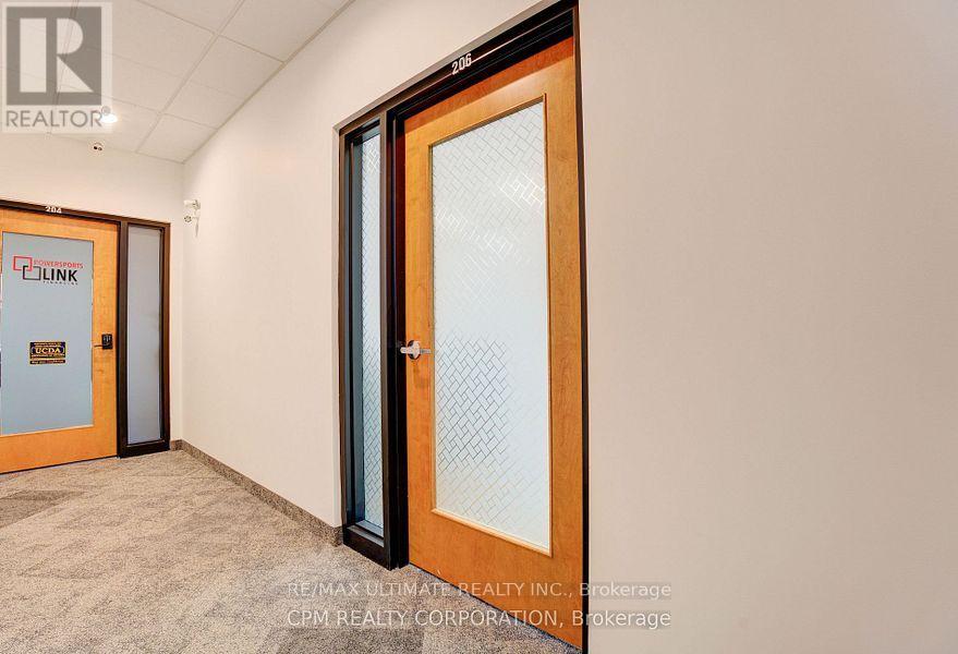 206 - 3485 Rebecca Street, Oakville, Ontario  L6L 0E3 - Photo 2 - W12307056