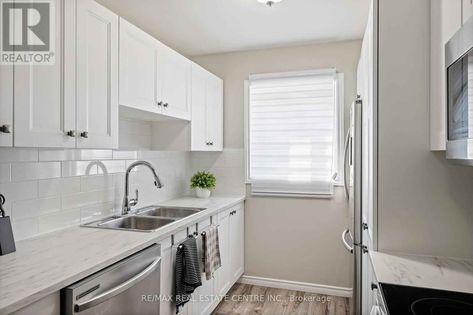 5 - 2 Cedar Drive, Orangeville, Ontario  L9W 2X6 - Photo 18 - W12307144