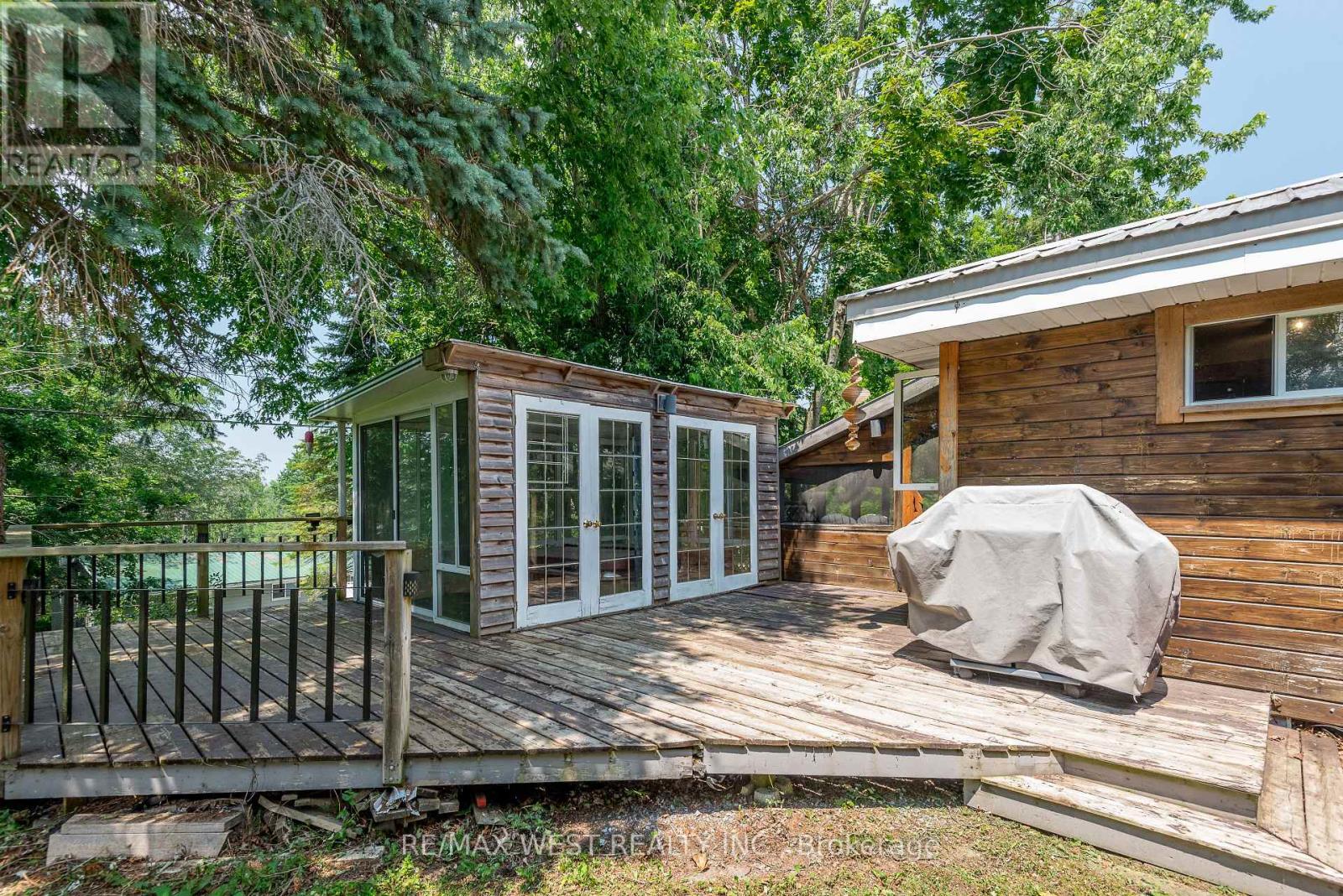 8 Robins Lane, Kawartha Lakes (Carden), Ontario  L0K 1W0 - Photo 7 - X12292743