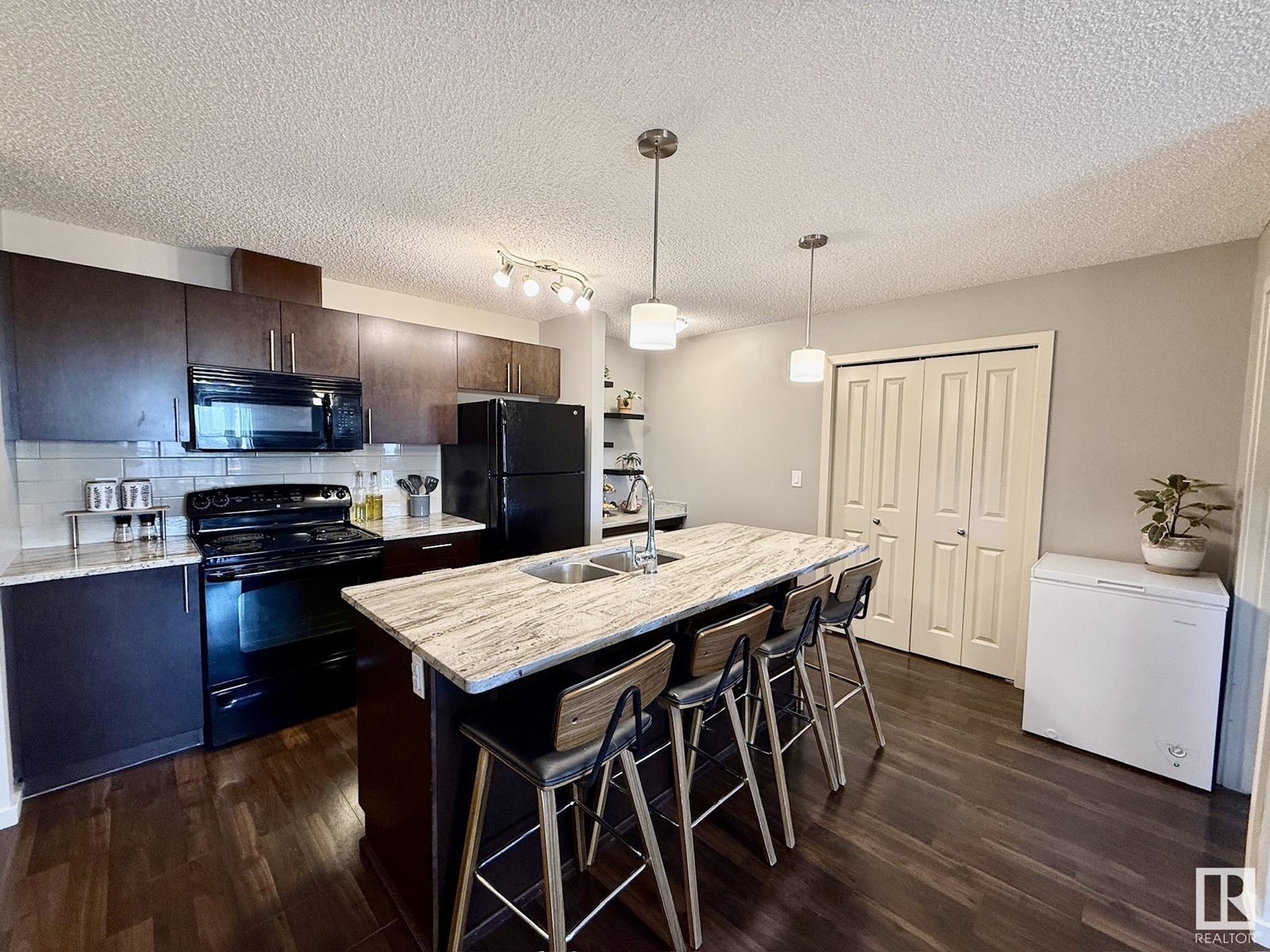 Property at #402 3353 16A AV NW image 3