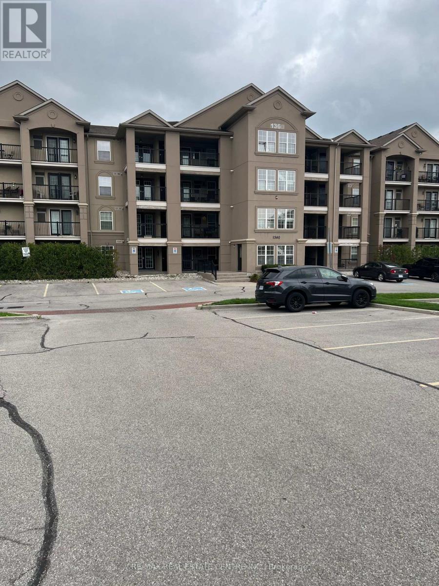 409 - 1360 Main Street E, Milton, Ontario  L9T 7S5 - Photo 1 - W12287951