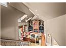 Loft Entertainment Area Overlooks the Living Room