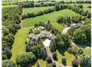 Nestled on 2.5 Acres Behind Private Gates!