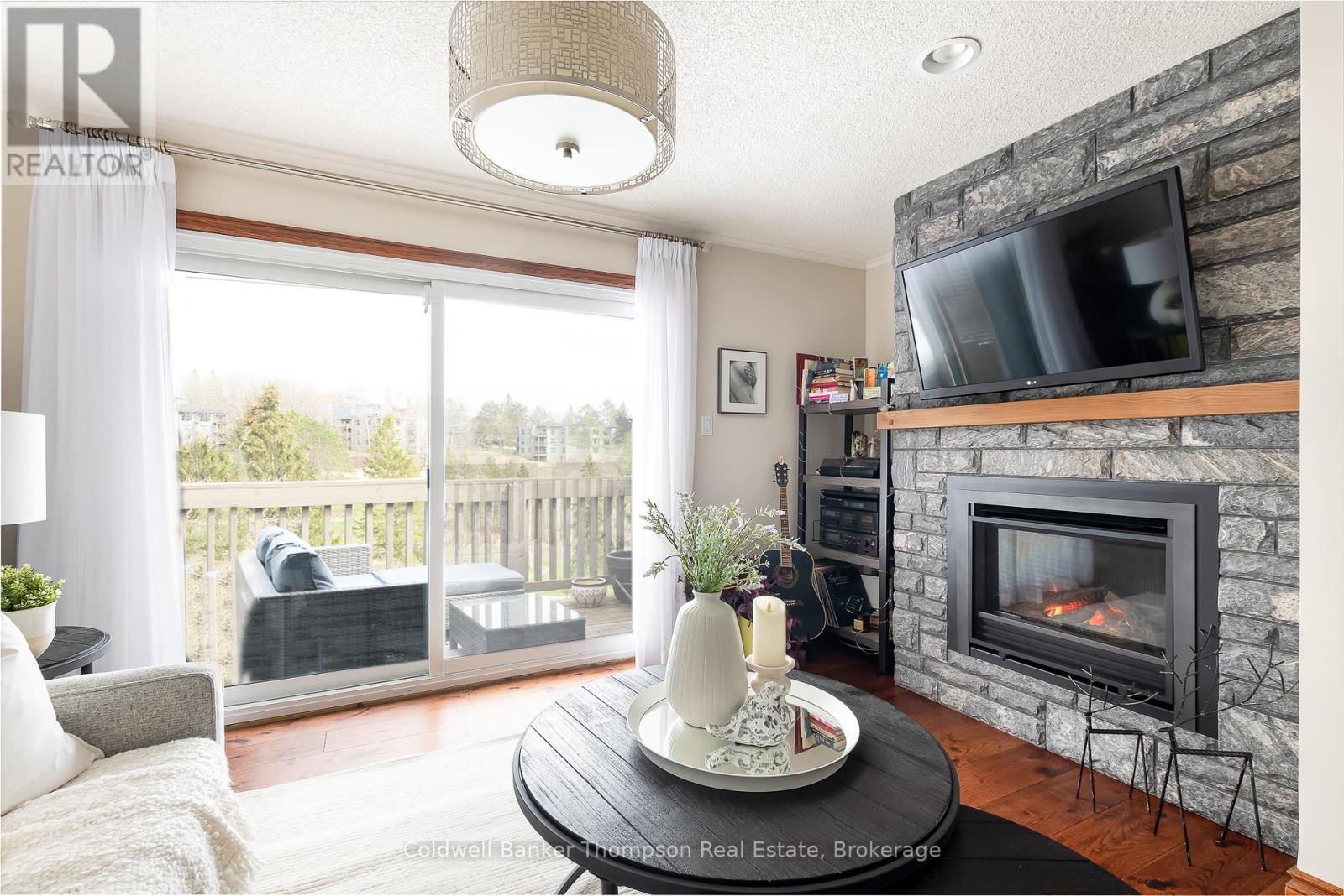 301 - 34 Deerhurst Greens Road, Huntsville, Ontario  P1H 1A9 - Photo 1 - X12308091