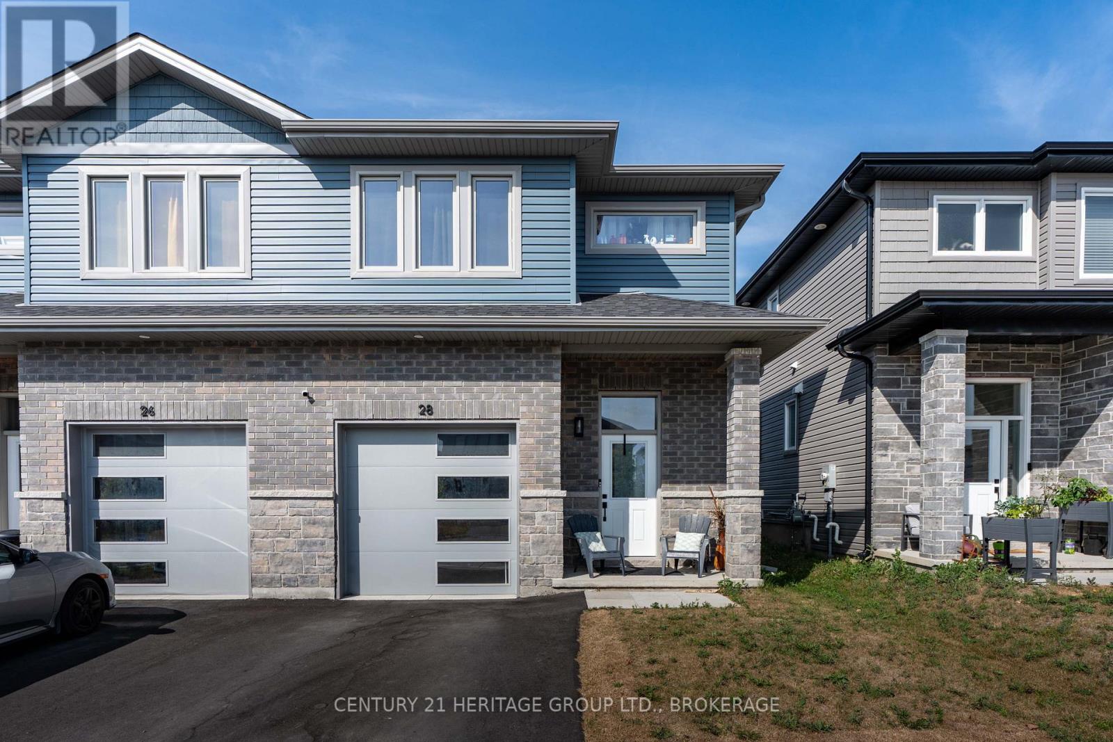 28 Dusenbury Drive, Loyalist, Ontario  K0H 2H0 - Photo 1 - X12308183