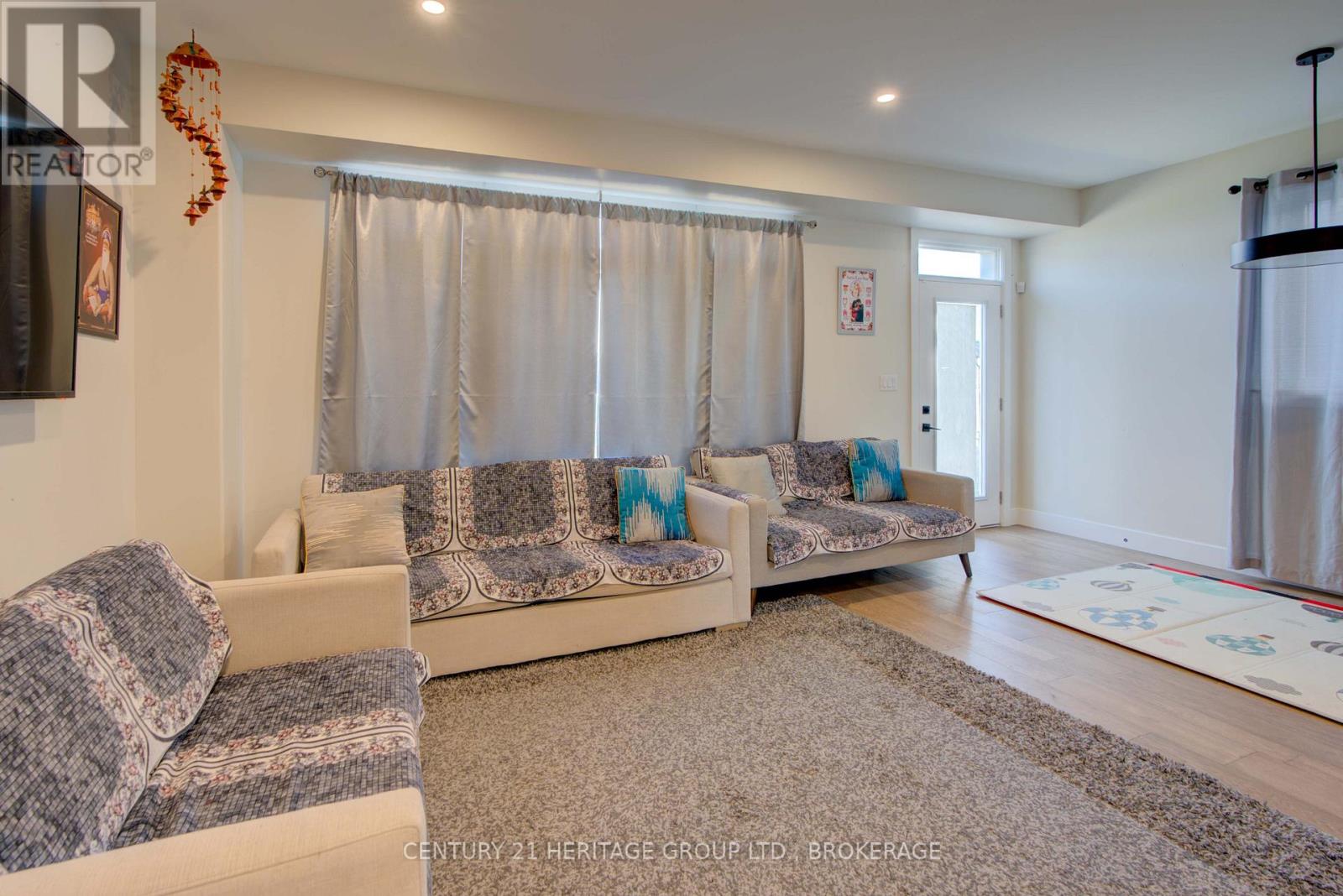 28 Dusenbury Drive, Loyalist, Ontario  K0H 2H0 - Photo 15 - X12308183