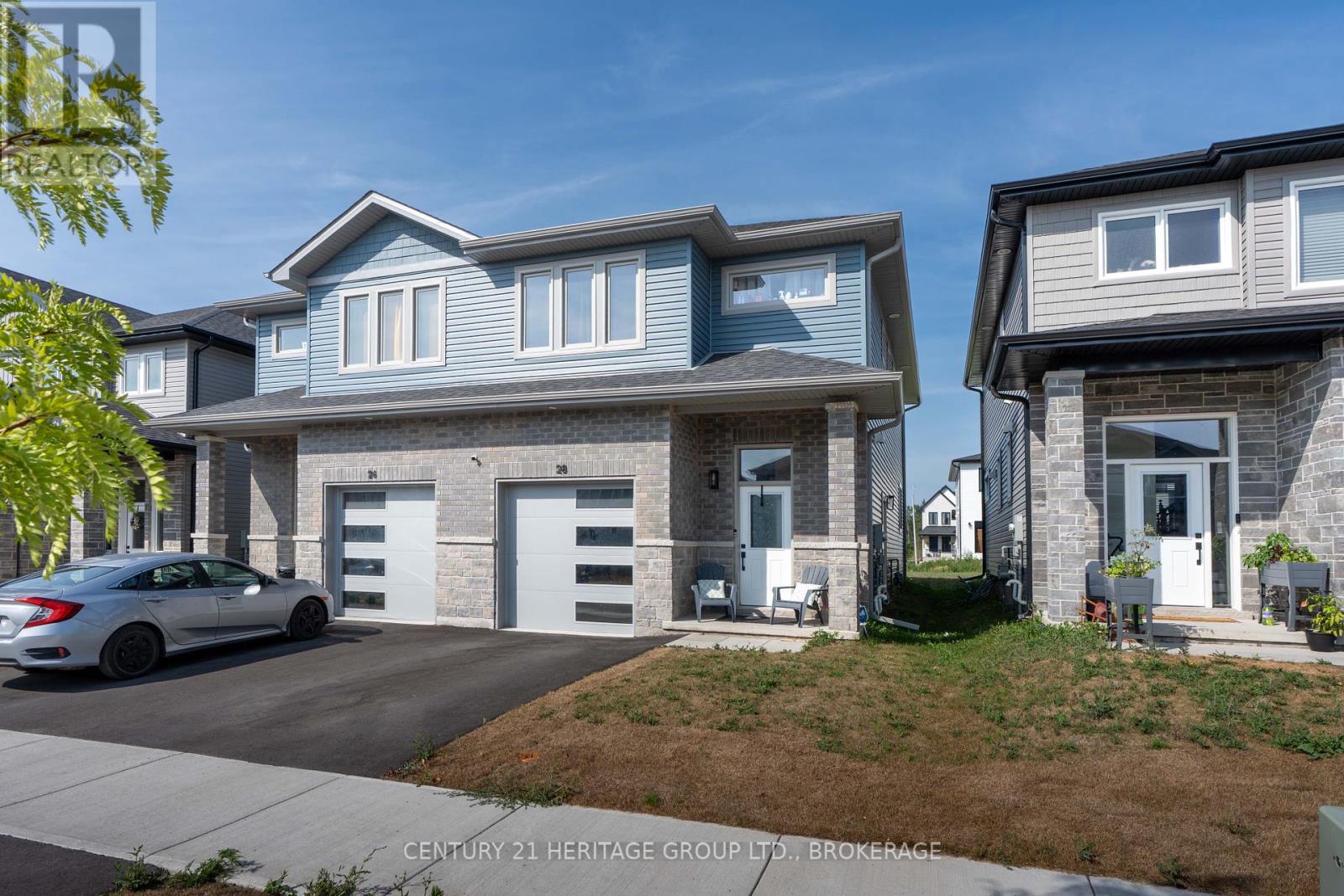 28 Dusenbury Drive, Loyalist, Ontario  K0H 2H0 - Photo 2 - X12308183