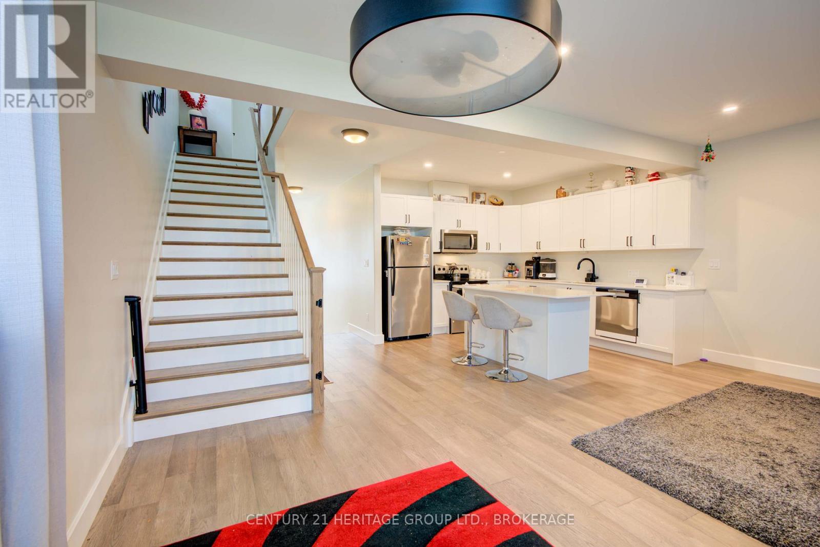 28 Dusenbury Drive, Loyalist, Ontario  K0H 2H0 - Photo 24 - X12308183