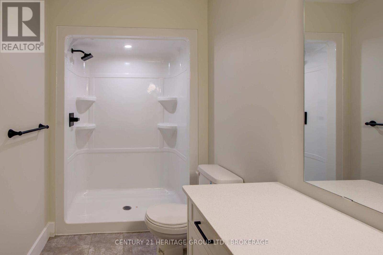 28 Dusenbury Drive, Loyalist, Ontario  K0H 2H0 - Photo 38 - X12308183