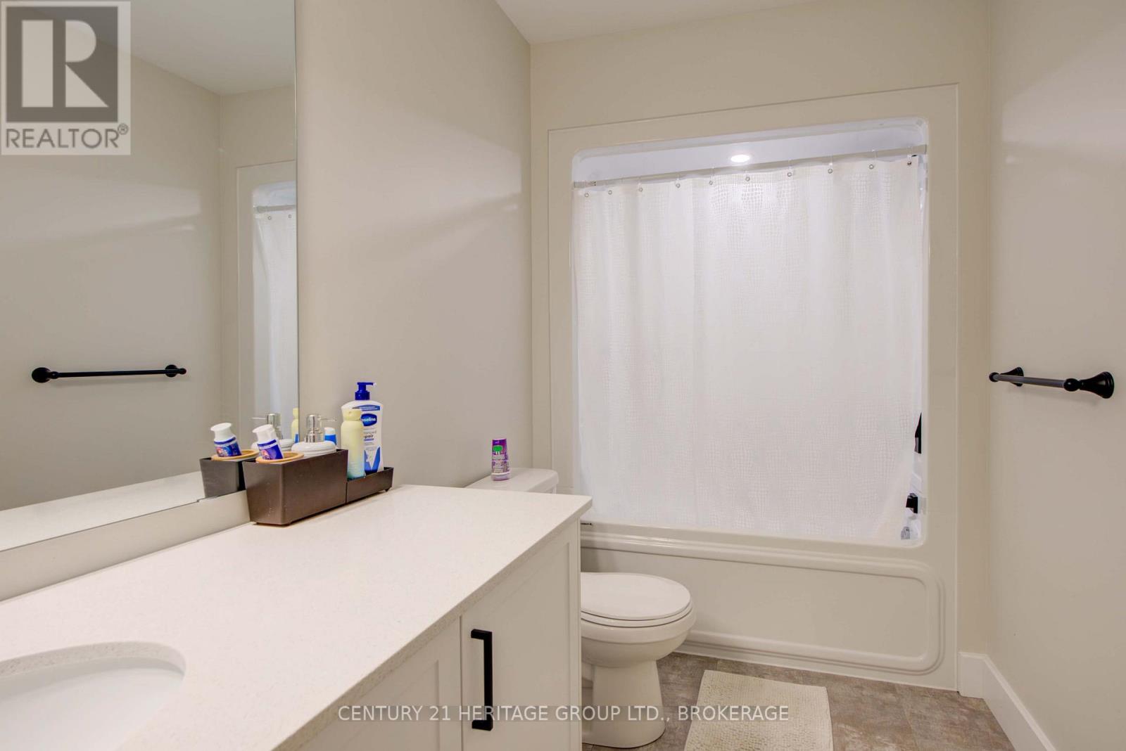 28 Dusenbury Drive, Loyalist, Ontario  K0H 2H0 - Photo 42 - X12308183