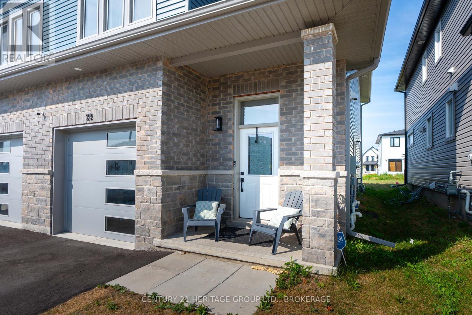 28 Dusenbury Drive, Loyalist, Ontario  K0H 2H0 - Photo 5 - X12308183