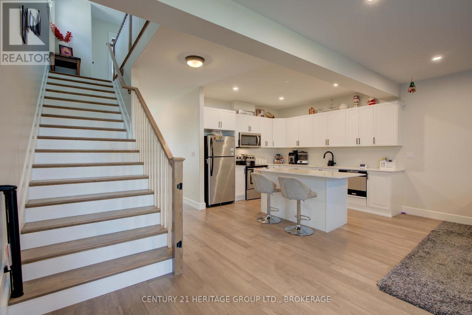 28 Dusenbury Drive, Loyalist, Ontario  K0H 2H0 - Photo 25 - X12308183