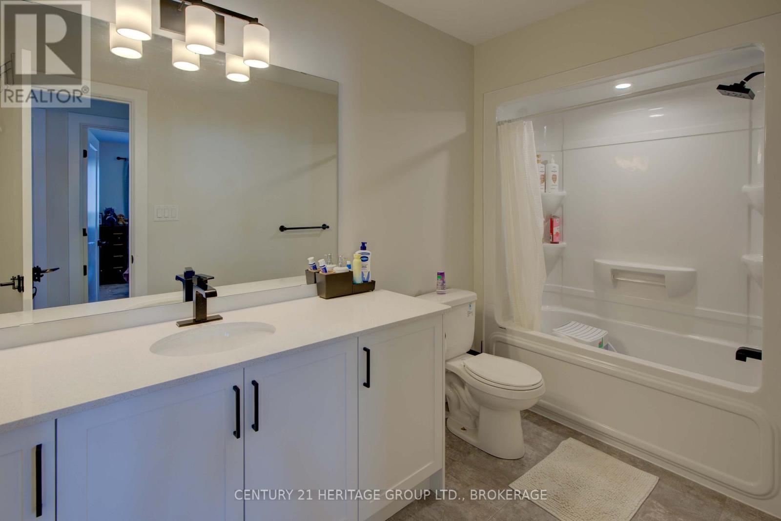 28 Dusenbury Drive, Loyalist, Ontario  K0H 2H0 - Photo 39 - X12308183