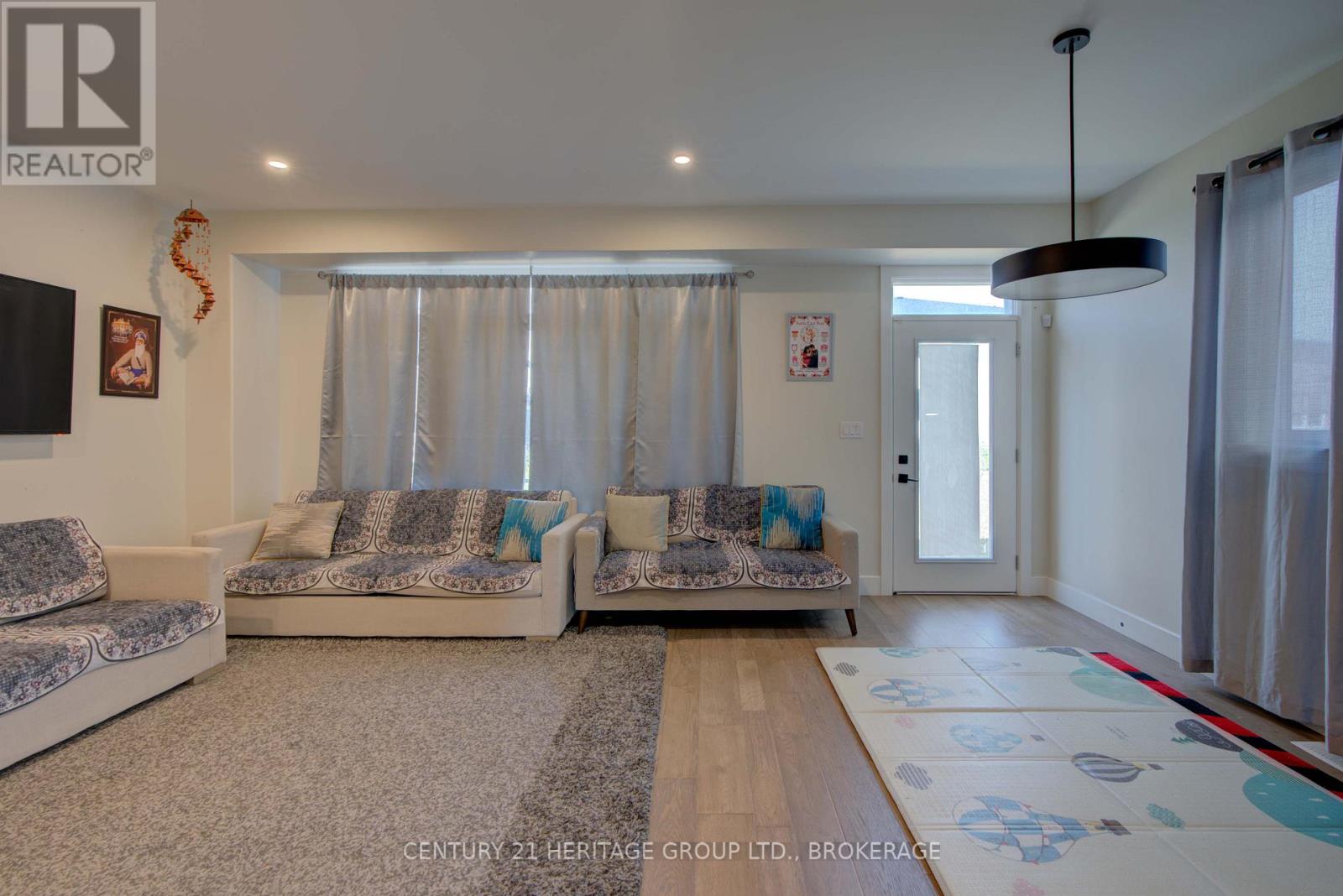 28 Dusenbury Drive, Loyalist, Ontario  K0H 2H0 - Photo 13 - X12308183