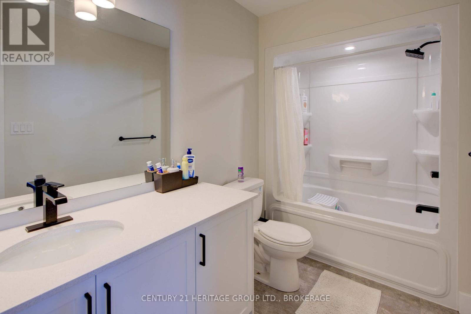 28 Dusenbury Drive, Loyalist, Ontario  K0H 2H0 - Photo 40 - X12308183