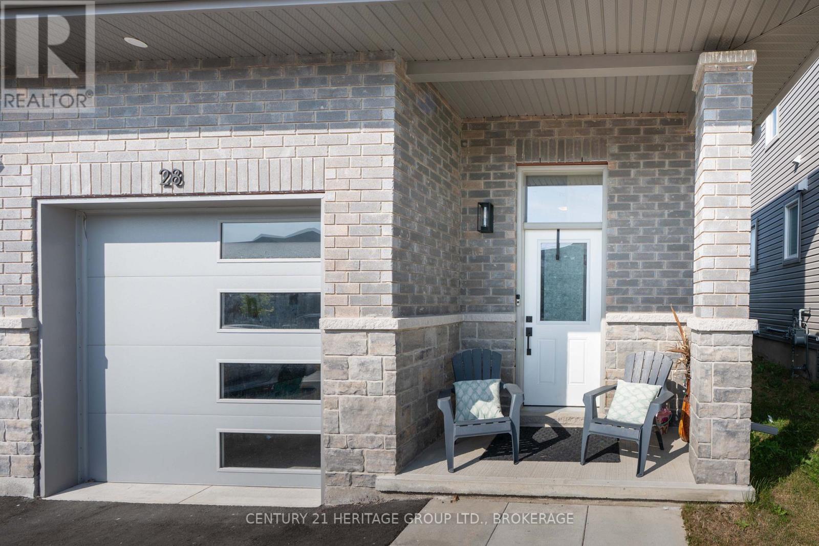 28 Dusenbury Drive, Loyalist, Ontario  K0H 2H0 - Photo 7 - X12308183