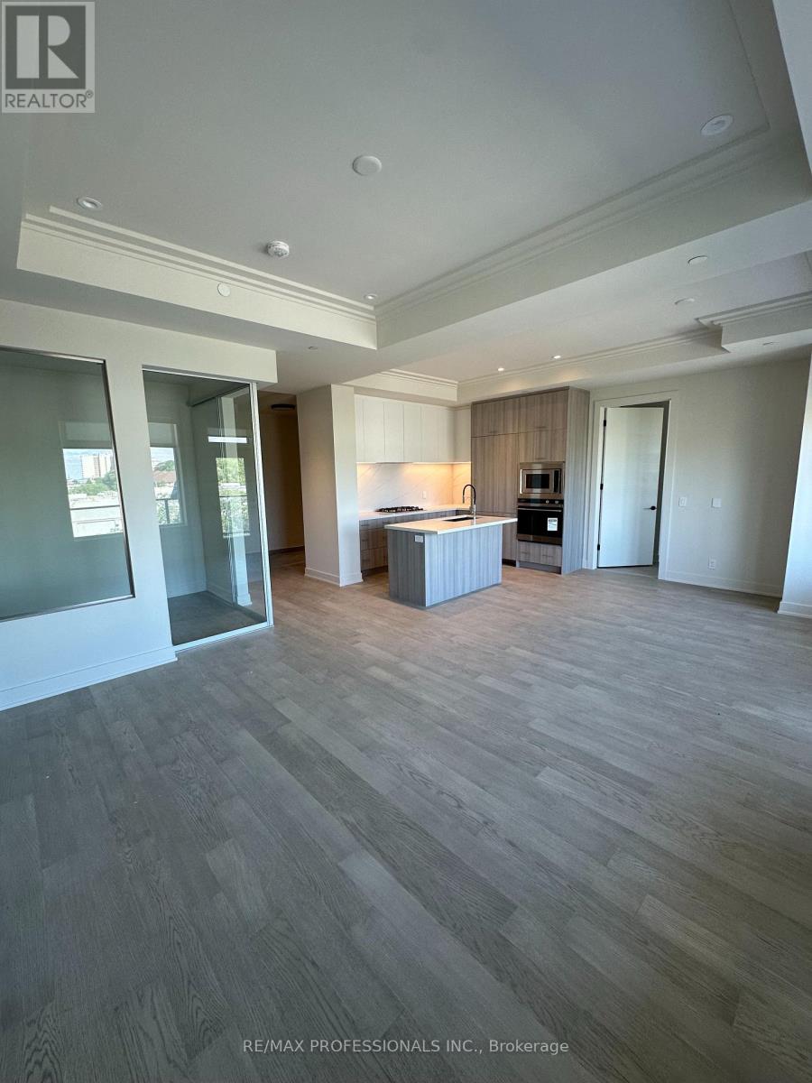 410 - 123 Maurice Drive, Oakville, Ontario  L6K 2W6 - Photo 2 - W12308756