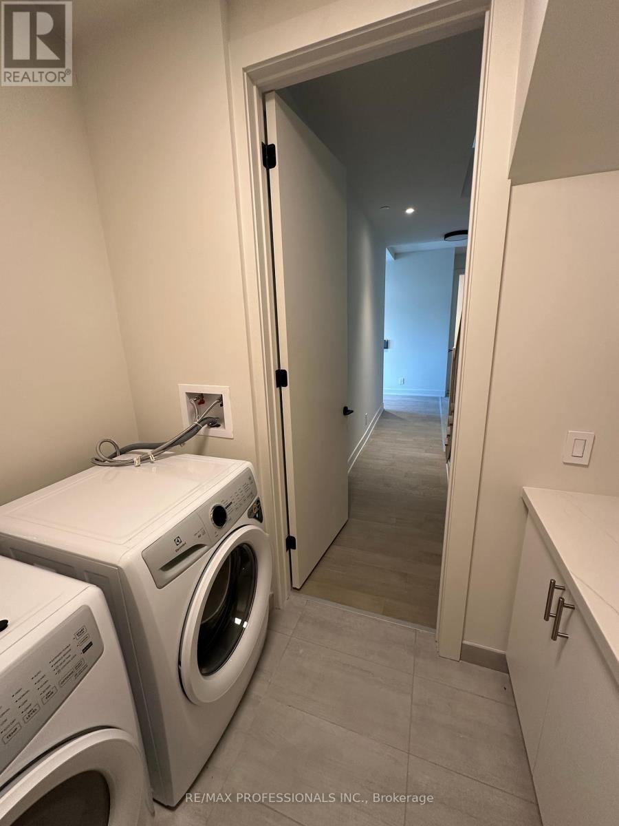 410 - 123 Maurice Drive, Oakville, Ontario  L6K 2W6 - Photo 7 - W12308756