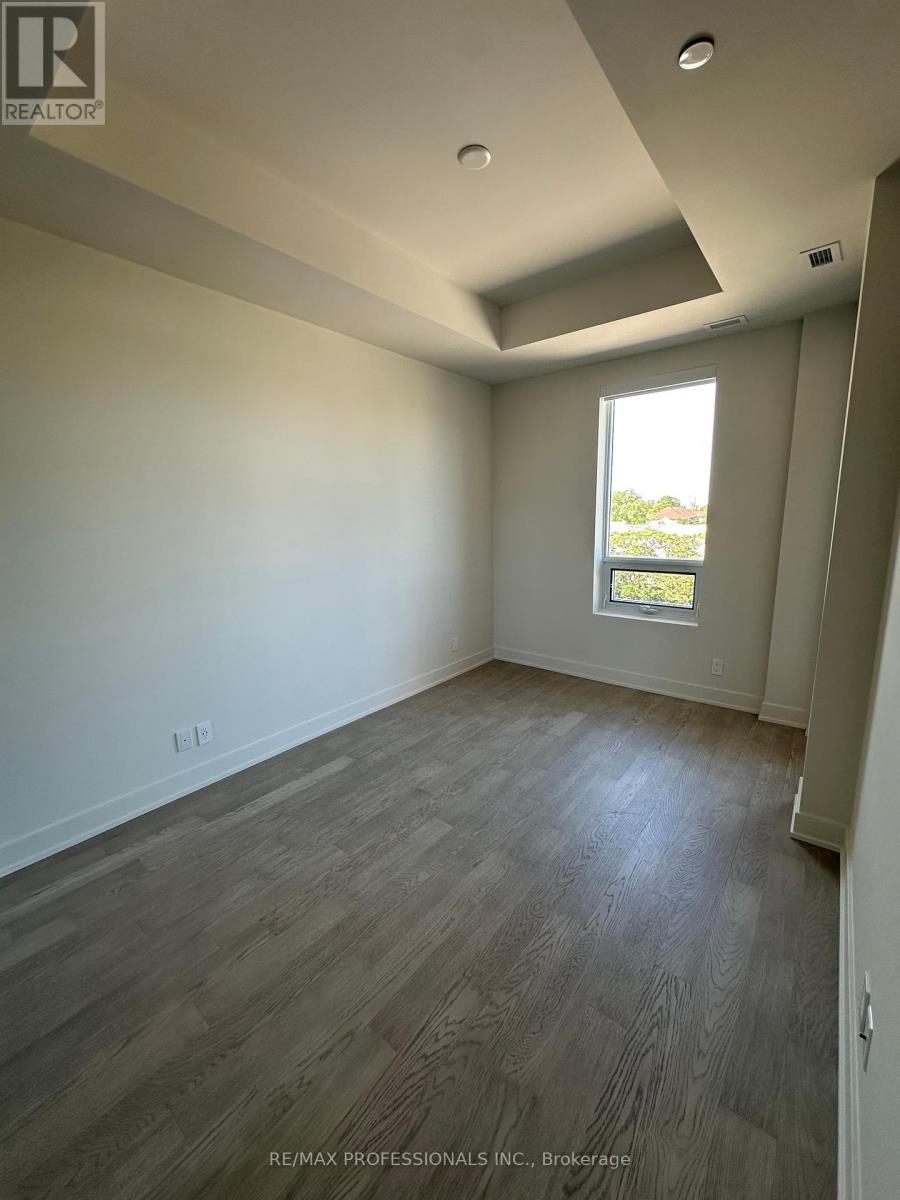 410 - 123 Maurice Drive, Oakville, Ontario  L6K 2W6 - Photo 9 - W12308756