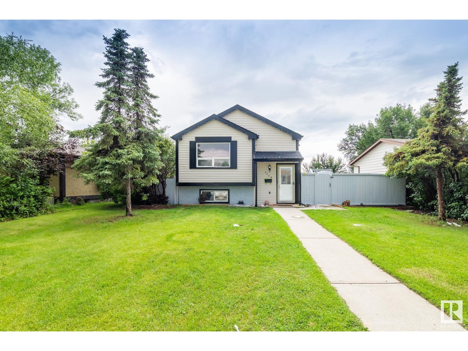 Property at 3708 12 AV NW image 1