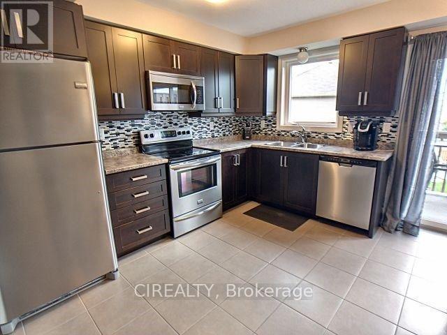 12 - 201 Westbank Trail, Hamilton, Ontario  L8J 0H4 - Photo 4 - X12309042