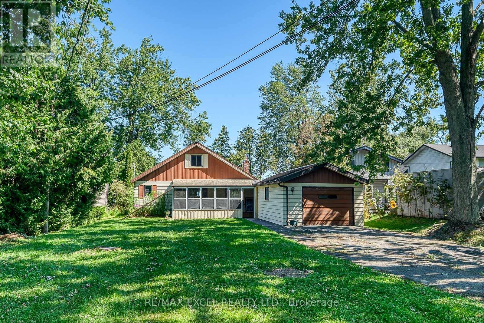 124 Moore's Beach Road, Georgina, Ontario  L0E 1N0 - Photo 2 - N12304621