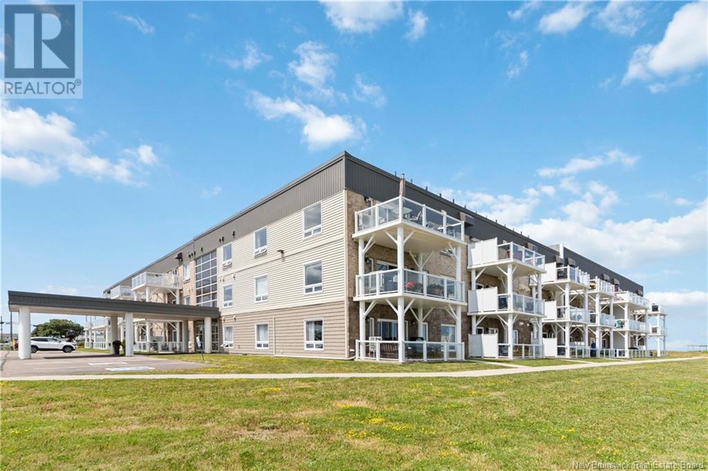 Oceanfront Condo Living in Shediac! Welcome to your dream coastal retreat! This stunning 2 bedroom, 2 bathroom condo offers breathtaking ocean views and an unbeatable location in the heart of Shediacs waterfront.  Wake up to the sound of the waves and enjoy the serenity of beachside living from your own home.   Step inside to a spacious open-concept living area where the kitchen and dining space showcase a 7-foot quartz island, ample cabinetry, large windows, central vacuum and 9 foot ceilings that offer breathtaking panoramic views of the oceanvisible right from your living room and master bedroom.  The well equipped condo also gives you access to resorts-style amenities, including an outdoor pool, hot tubs, fully equipped gym, a community living room, tennis/pickleball courts and a community garden.   Wether you are looking for a year round home, a seasonal getaway, or a smart investment, this property delivers the very best of coastal living. (id:48254)