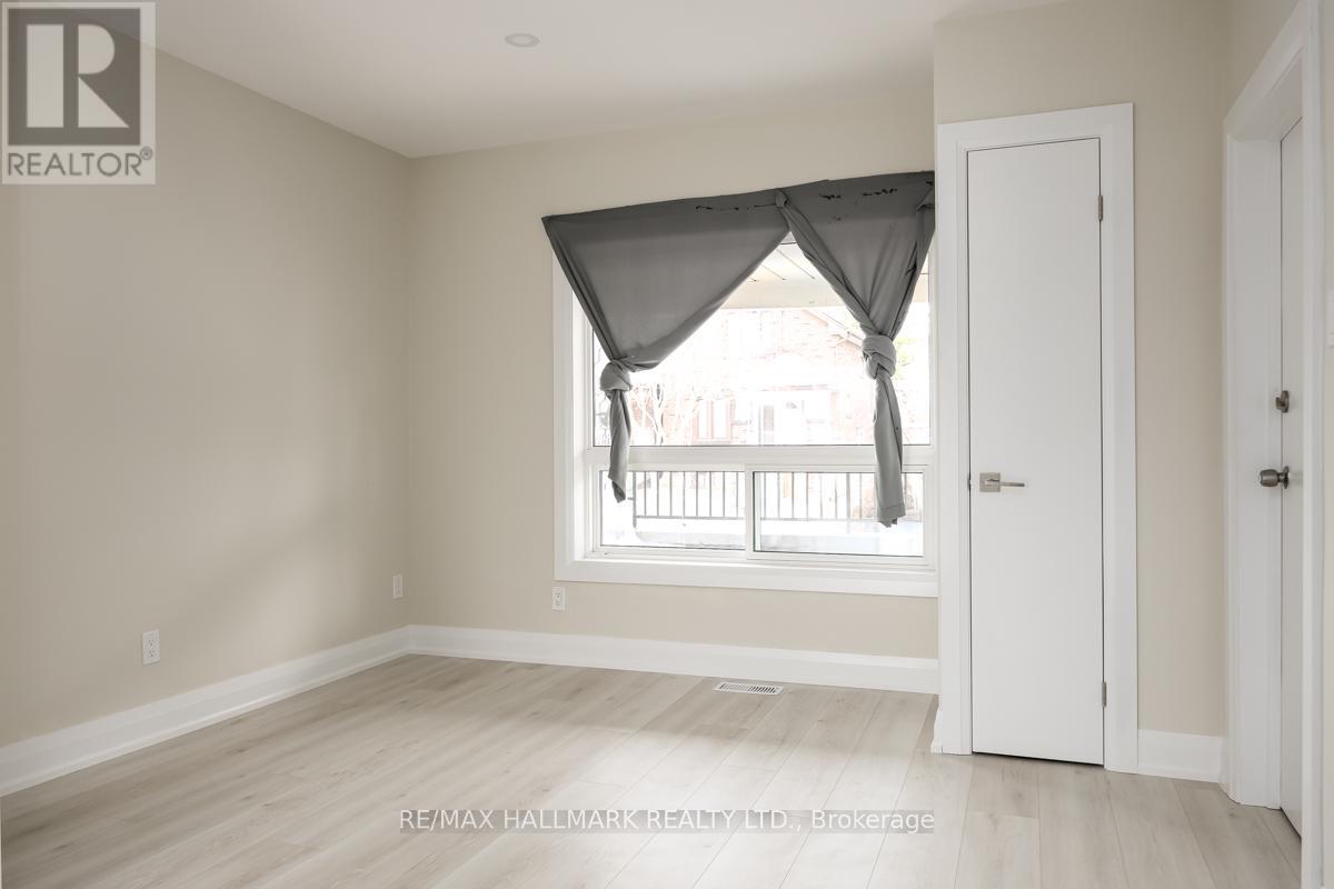 Main - 196 Livingstone Avenue, Toronto, Ontario  M6E 2M2 - Photo 3 - W12310526