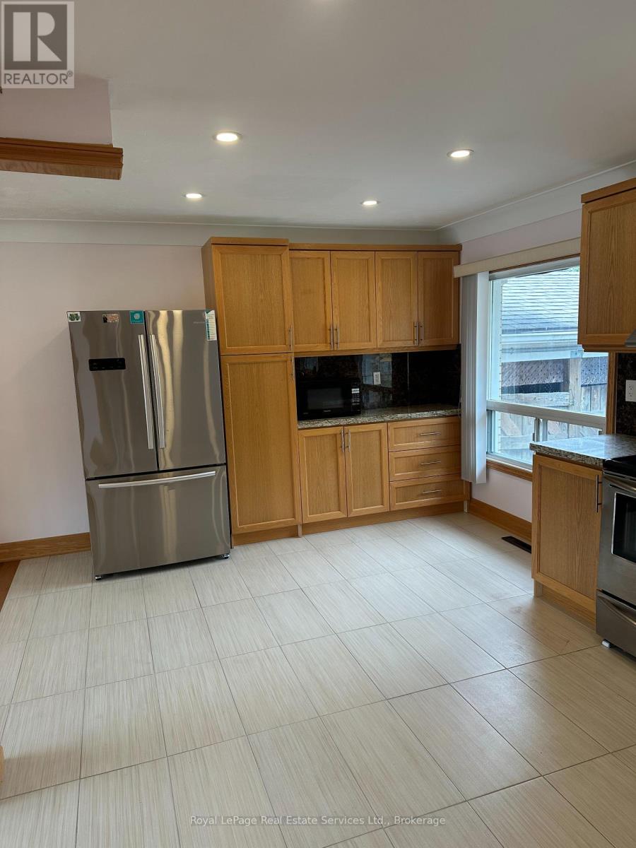 5971 Scott Street, Niagara Falls, Ontario  L2E 3B3 - Photo 5 - X12311048