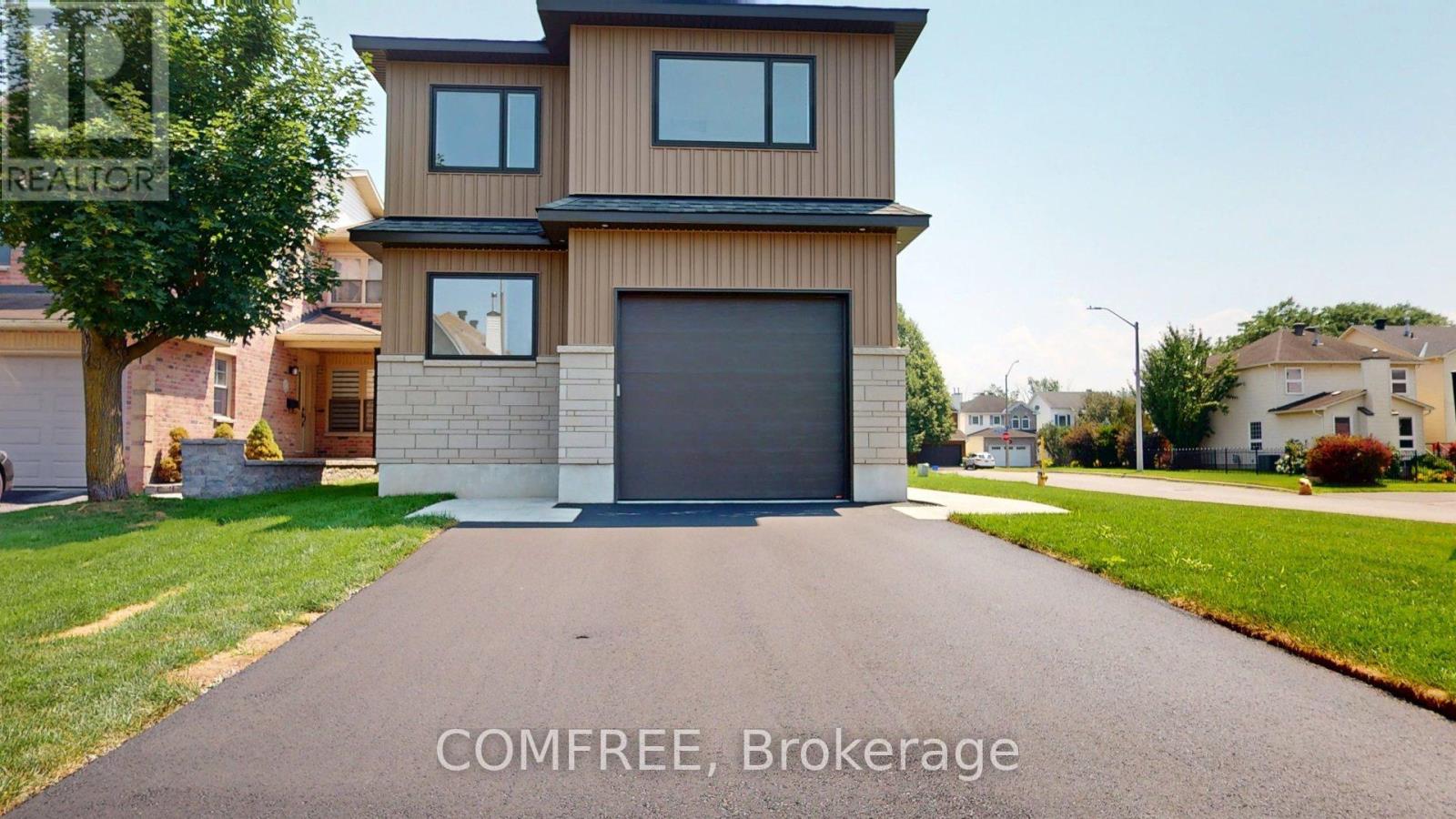 Property at 6584 WINDSONG AVENUE image 2