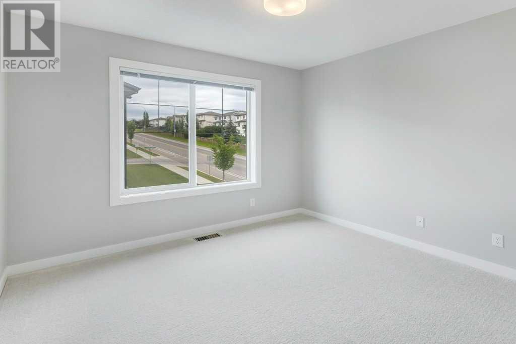 601 Jumping Pound Common, Cochrane, Alberta  T4C 2L1 - Photo 13 - A2243735