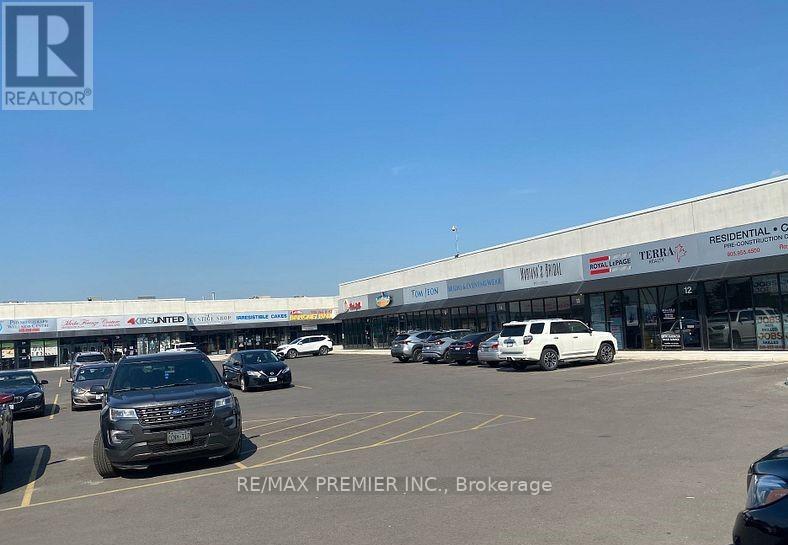 205 - 4040 Steeles Avenue W, Vaughan, Ontario  L4L 4Y5 - Photo 1 - N12311293