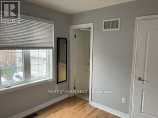 Coach House - 7 Ivy Stone Court, Markham, Ontario  L6B 1H6 - Photo 10 - N12314195