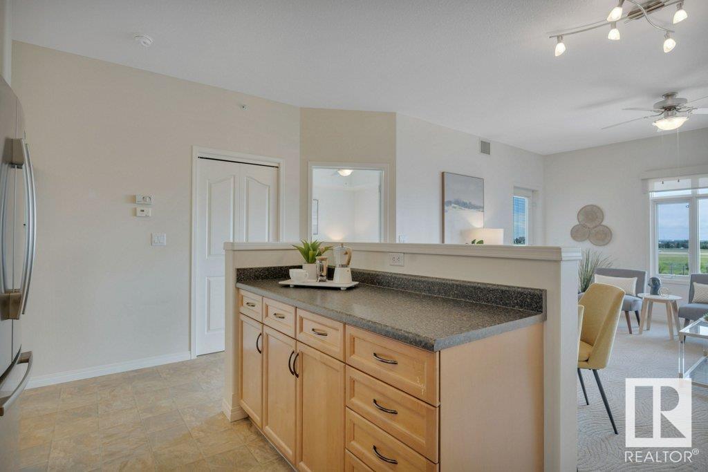 Property at #403 1589 GLASTONBURY BV NW image 2