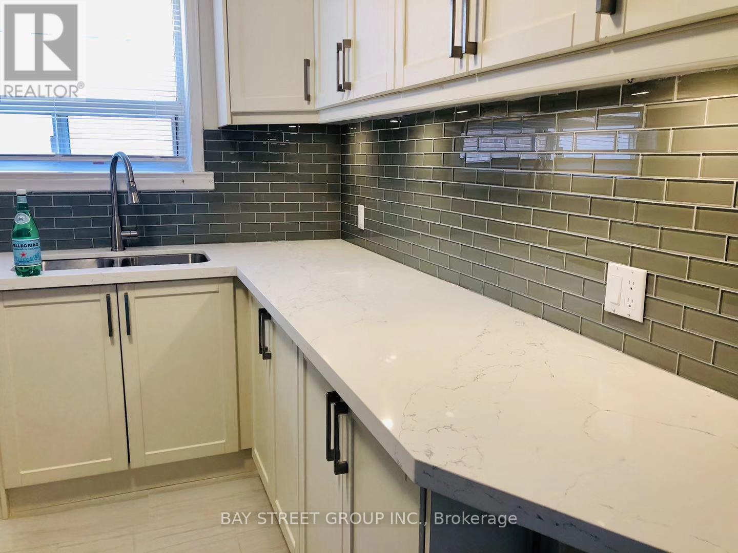 Main - 33 Bentworth Avenue, Toronto, Ontario  M6A 1P1 - Photo 5 - W12314369