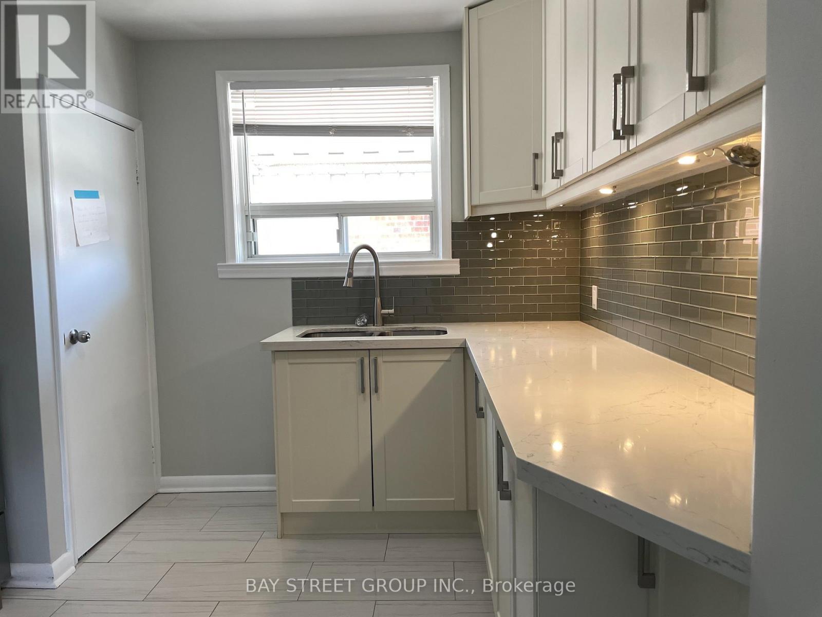 Main - 33 Bentworth Avenue, Toronto, Ontario  M6A 1P1 - Photo 6 - W12314369