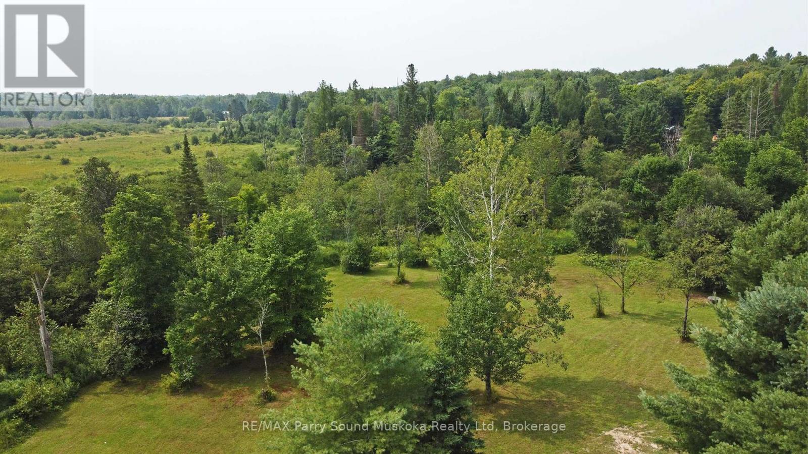 811 Centre Road, Mckellar, Ontario  P2A 0B4 - Photo 4 - X12313739