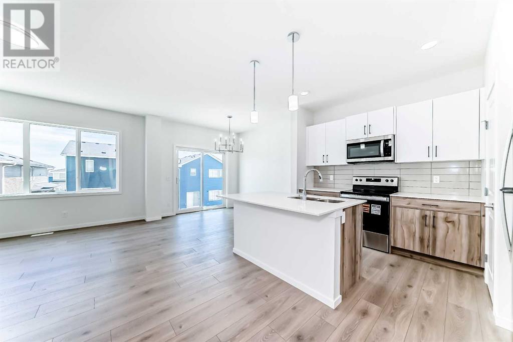 934 Bayview Heights Sw, Airdrie, Alberta  T4B 5M6 - Photo 6 - A2236726